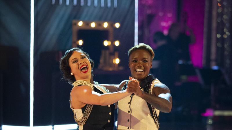 Katya Jones and Nicola Adams dance a quickstep together, looking very happy,