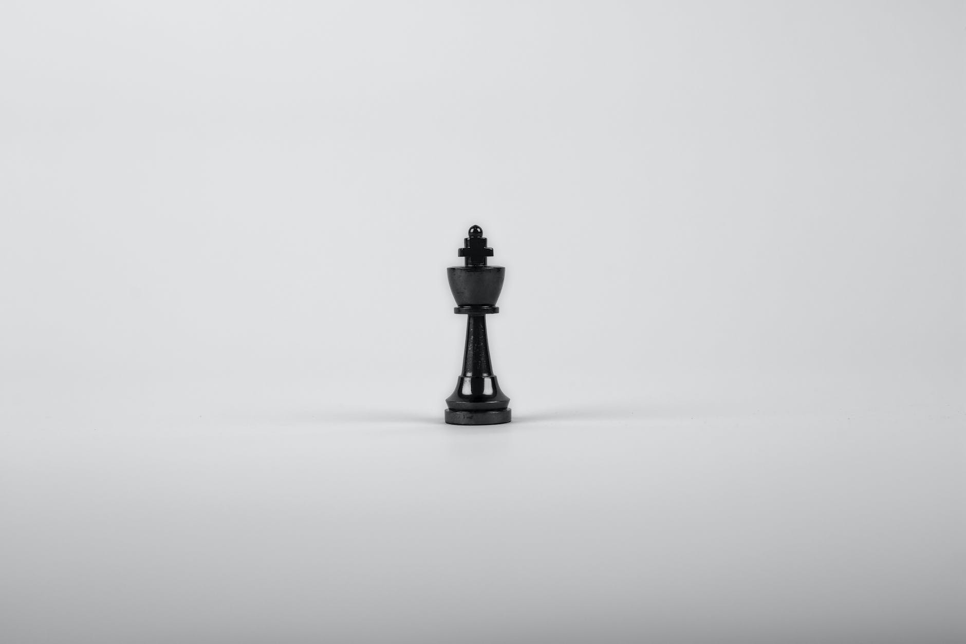 A black chess piece on a white background.